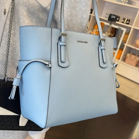 MICHAEL KORS Voyager Large Saffiano Leather EW Tote Shoulder Bag
LIGHT SKY
NWT - Picture 7 of 16